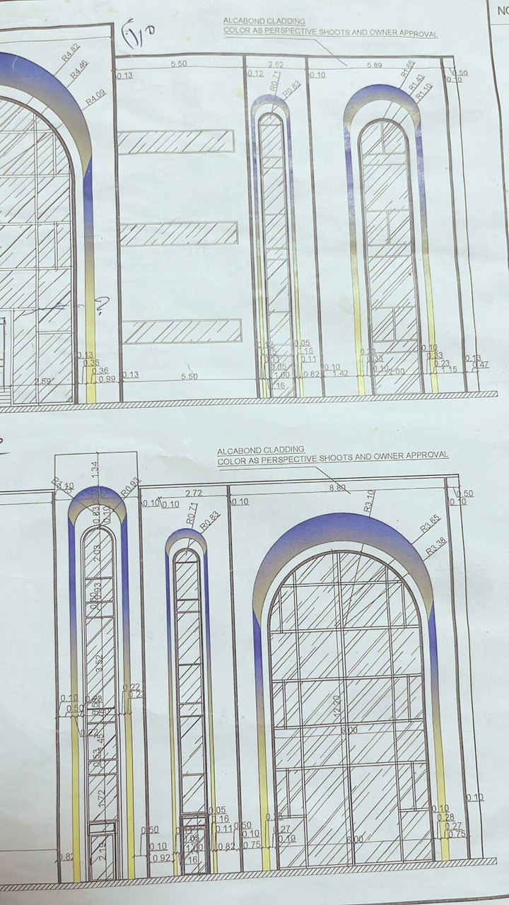 Approved elevations and cladding colour selection, signed off by the owner.